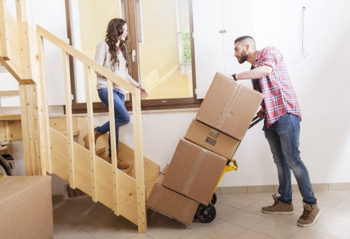 Professional man and van in Sipson loading furniture and boxes