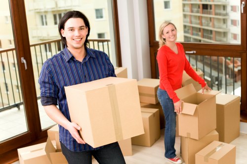 Professional movers loading boxes during a Sipson relocation